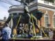 Workers haul away the statue of Confederate General Robert E. Lee from Market Street Park in Charlottesville, Virginia, USA, 10 July 2021. Image credit: EPA
